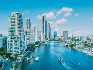 An aerial view of Surfers Paradise as a boat travels up the river