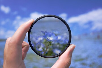 magnifying glass in hand