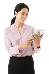 Portrait closeup isolated cut out shot of Asian smart happy confident successful female officer stand smiling holding using wifi touchscreen computer tablet in hands in front of white background