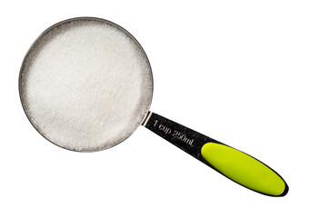 refined white sugar from in measuring cup cutout