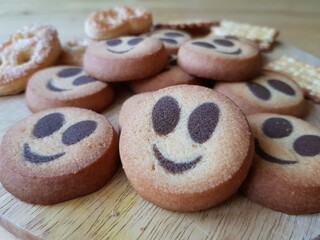 Cookies in the form of funny emoticons for breakfast