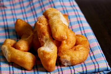 close-up view of fried dough sticks on knapkin