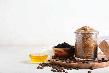 Composition with coffee body scrubs on light background