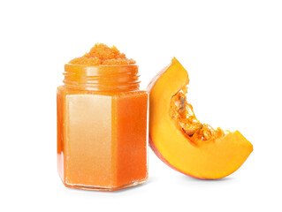 Jar of pumpkin body scrub on white background