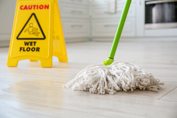 Floor mop in kitchen, closeup
