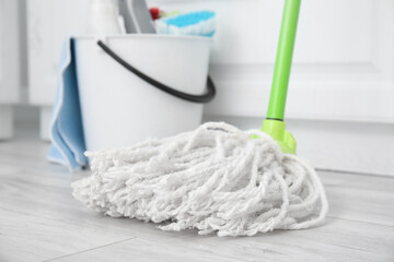 Floor mop in kitchen, closeup