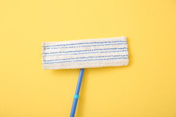 Floor mop on color background, closeup
