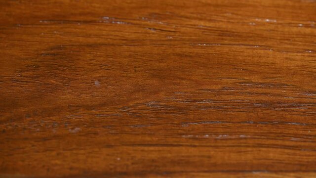 Close-up texture of Wooden Floors. Solid real home architecture Wood Floors background. Camera 4k Slide from motorized slider.
