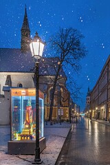 Ulica grodzka z szopką noworoczna z neonem przy padającym śniegu - obrazy, fototapety, plakaty