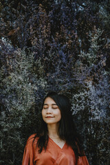 Naklejka premium beautiful woman in colorful beautiful flowers.