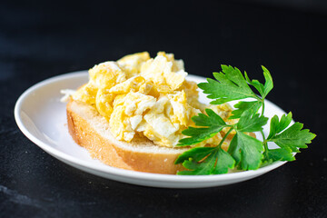 scrambled fried eggs scrumble fresh breakfast organic, wholesome dish on the table healthy food meal snack copy space food background rustic. top view keto or paleo diet