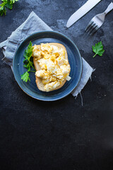 scrambled fried eggs scrumble fresh breakfast organic, wholesome dish on the table healthy food meal snack copy space food background rustic. top view keto or paleo diet