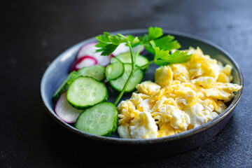 scrambled fried eggs scrumble fresh breakfast organic, wholesome dish on the table healthy food meal snack copy space food background rustic. top view keto or paleo diet