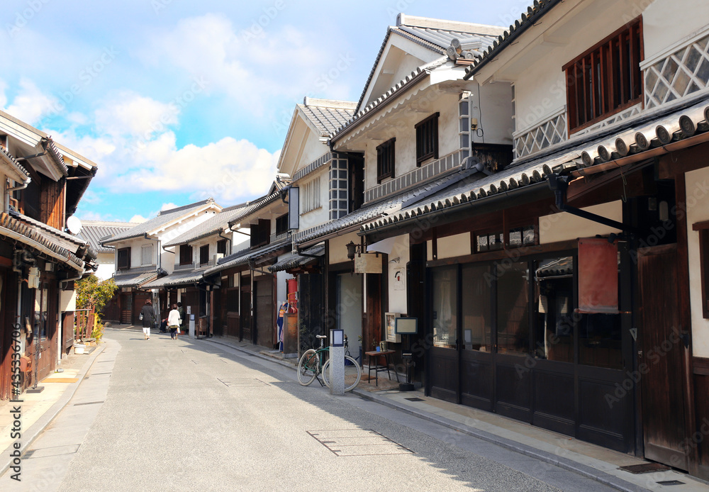 Sticker street with traditional japanese houses, bikan district, kurashiki, japan