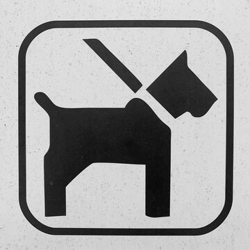 Grafik, Hund an der Leine  ein schwarz-weißes Symbol.