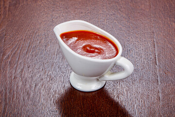 Tasty ketchup in the bowl