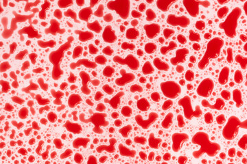 bloody drops on a white background texture. bubbles in red water