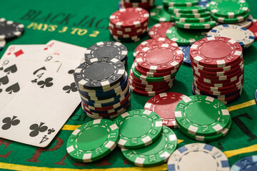 poker play cards and chips on green table