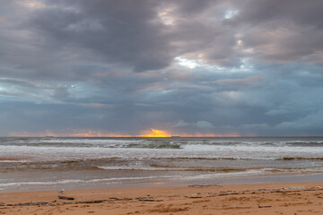 Fototapeta premium Rainy day sunrise at the lagoon