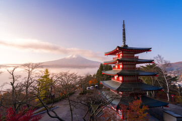 Fototapeta premium Rare scene of Chureito pagoda and Mount Fuji with morning fog, Japan in autumn