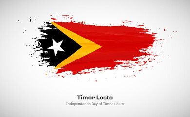 Creative happy independence day of Timor Leste country with grungy watercolor country flag background