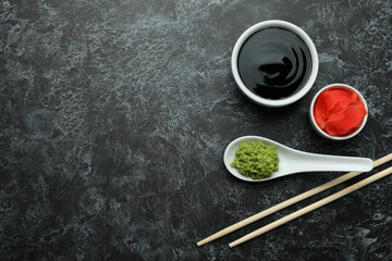 Fototapeta na wymiar Concept of sushi eating on black smokey background