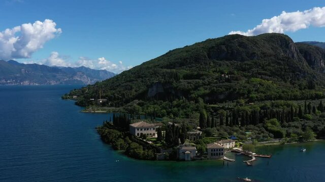 Panorama of punta san vigilio. Aerial view of Parco Baia delle Sirene, Lake Garda, Italy. Top view of baia delle sirene on the coastline of Lake Garda. Baia delle Sirene on the coastline.	