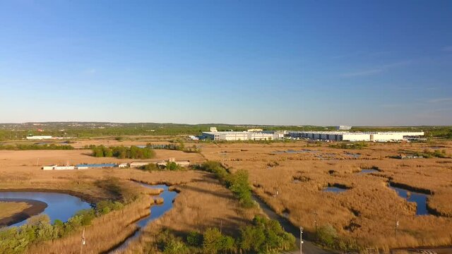 Aerial Distant View of Giant Amazon Fulfillment Center Warehouses - Part 1