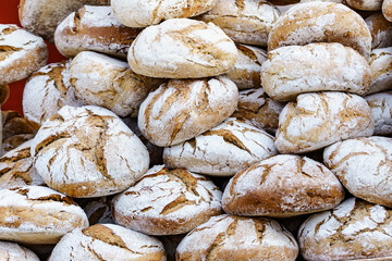 Many rustic fresh bread loaves