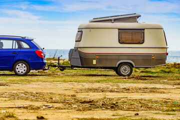 Caravan trailer camping on coast, Spain.