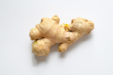 Freshness raw ginger on white background . Vegetable or ingredient in asia culinary ,spicy test ,growing in soil. top view, flat lay.