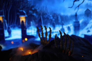 Skeleton Zombie Hand Rising Out Of A GraveYard - Halloween