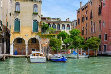 Grand Canal with boats in Venice, Italy. Architecture and landmarks of Venice. Venice postcard
