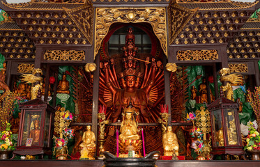 Fototapeta na wymiar The shining copper Buddhist statue