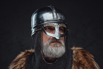 Studio shot of elder crusader with steel helmet