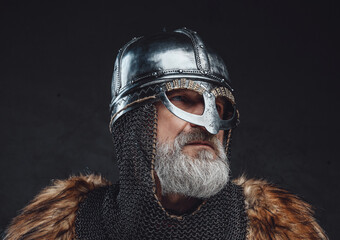 Studio shot of elder crusader with steel helmet