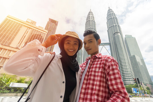 Travel Concept, Portrait Of Cute Malay Asian Couple Outdoor