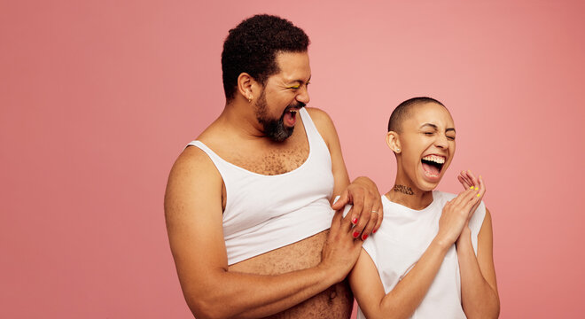 Cheerful Gender Nonconforming Friends Standing Together