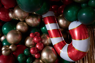 christmas decorations with colored balloons on background