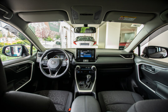 Uzhhorod, Ukraine. April 20, 2021 gray car of the Japanese brand Toyota RAV 4 hybrid. SUV, crossover. Reliable and beautiful car. The car in the cabin.