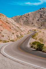 Panorama of the road in the Valley of Fire Park in Nevada. Amazing scenery on the road between the orange rocks