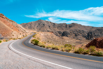 Panorama of the road in the Valley of Fire Park in Nevada. Amazing scenery on the road between the orange rocks
