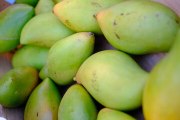 Tasty juicy ripe mango in the market 