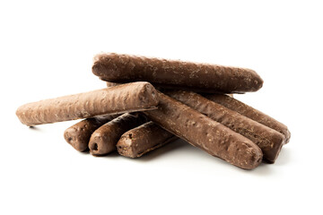 Corn sticks in a close-up on a white isolated background, chocolate sticks, shadows, sweets