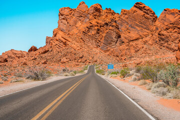 Panorama of the road in the Valley of Fire Park in Nevada. Amazing scenery on the road between the orange rocks