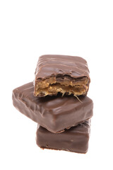chocolate candies with caramel and nuts isolated