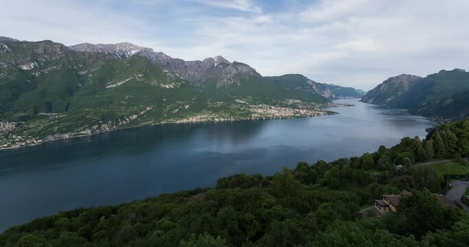 Day to night time lapse of Civenna panoramic view over Lake Como, Lecco branch during sunset.