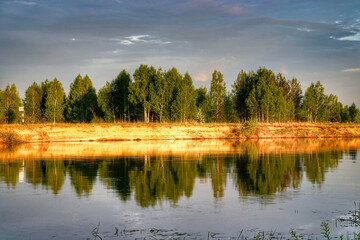 Reflection of the forest in the river