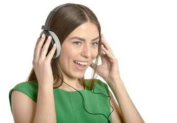 Naklejka premium Girl listening to music in headphones