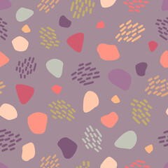 Colorful shapes of different size shapes, striped groups on a calm purple-gray background. Seamless abstract doodle pattern. Suitable for textile, packaging.